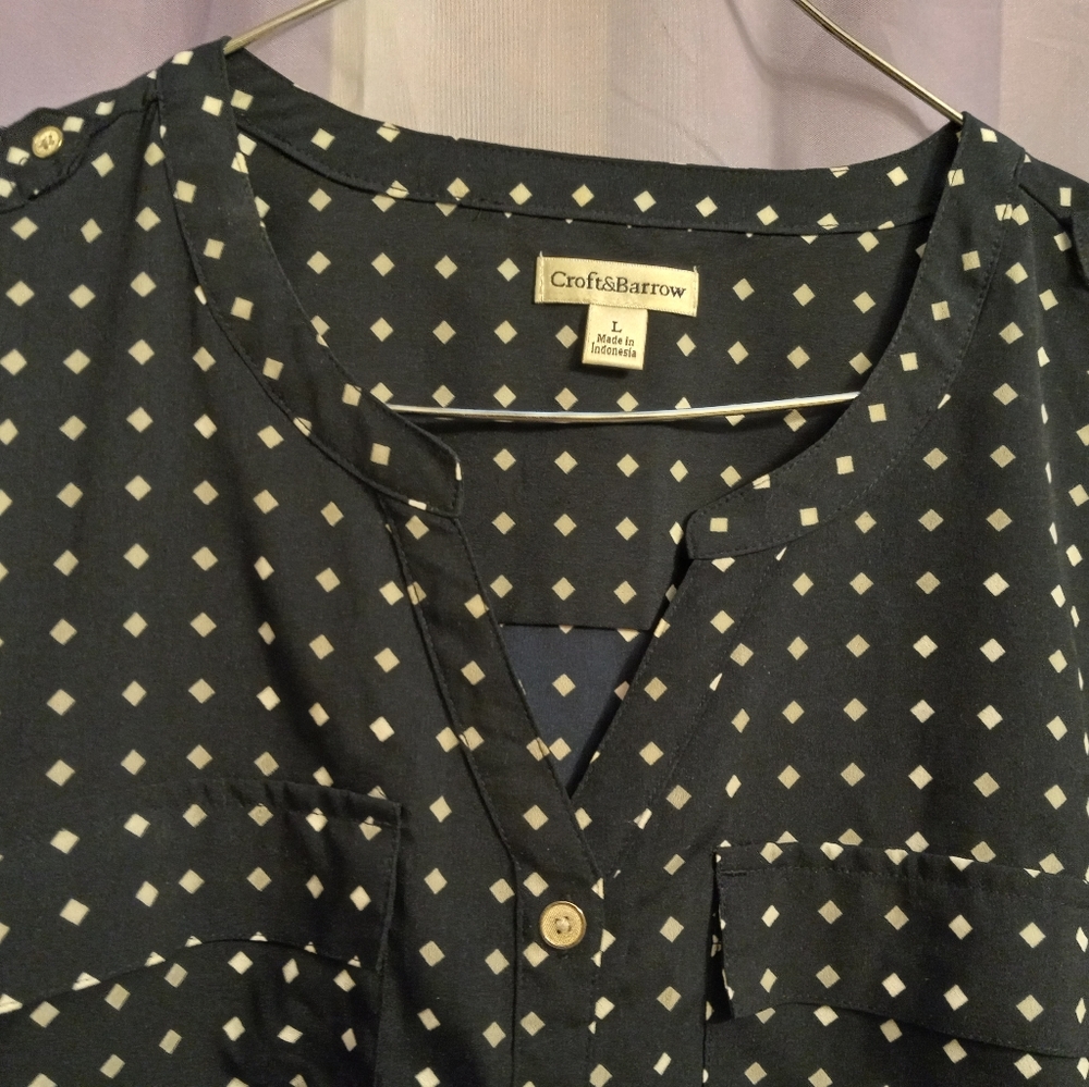 Navy blue with diamond shape,not polkadot. long or short sleeves.  Button up.
